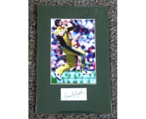 Cricket Glen McGrath signed and mounted Australia display. A white card signed by Australia cricket legend Glen McGrath profe