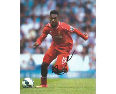 Daniel Sturridge signed 10x8 colour photo pictured while playing for Liverpool. Good Condition. All autographs come with a Ce