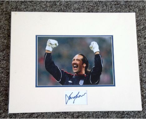 Football David Seaman signed and mounted display. A white card signed by the England legend professionally mounted with a col