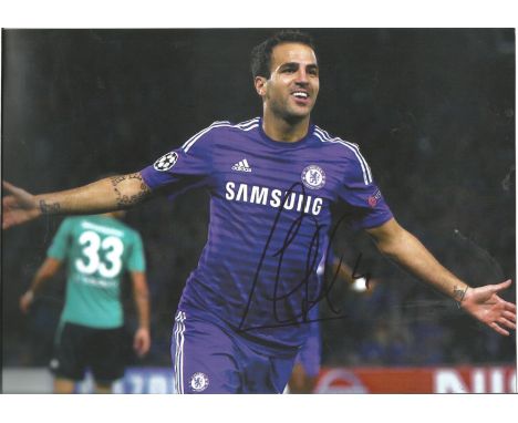 Cesc Fabregas signed 12x8 colour photo pictured while playing for Chelsea. Good Condition. All autographs come with a Certifi
