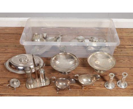 A large quantity of silver plate and other white metal items including tureens, salt and pepper shakers, gravy boat, scent bo