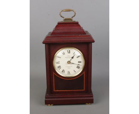 A modern "Sewills of Liverpool" 8-day mantel clock with a clear dial featuring Roman numerals. Height 28cm.  Working.