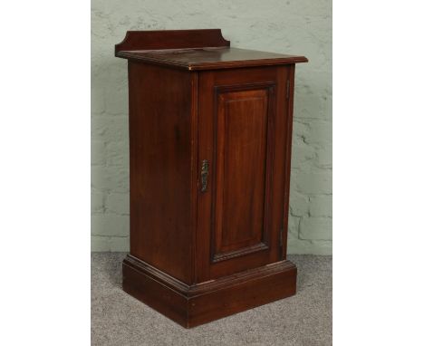 A mahogany pot cupboard, with interior shelf.