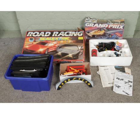 A collection of Scalextric to include boxed Grand Prix set, boxed Road Racing set and a collection of track pieces.  Grand Pr