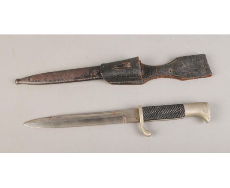 A German WWII period Third Reich K98 Kriegsmarine bayonet, with steel scabbard and leather frog, blade stamped 2nd model make