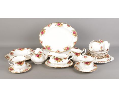 A collection of Royal Albert Old Country Roses ceramics. Includes cups and saucers, teapot, oval dishes and sauceboat.  Three