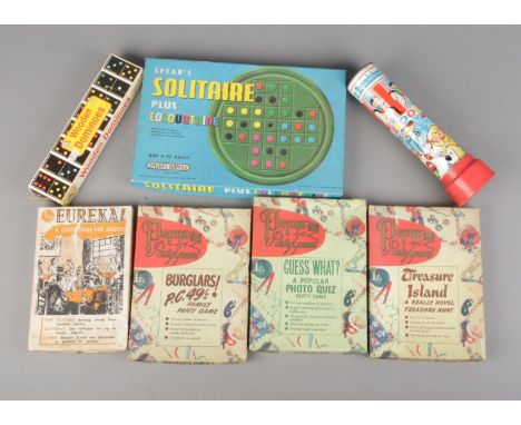 A collection of boxed games, along with a Magic Roundabout Kaleidoscope. Includes Eureka, Pepys Party Games, wooden dominoes 
