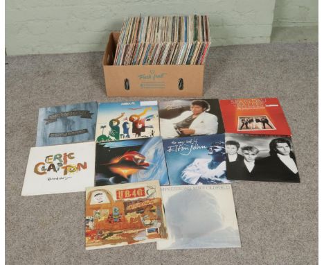 A box of assorted vinyl LP records of mainly rock and pop to include ABBA, Elton John, Duran Duran, Bon Jovi, Mike Oldfield, 