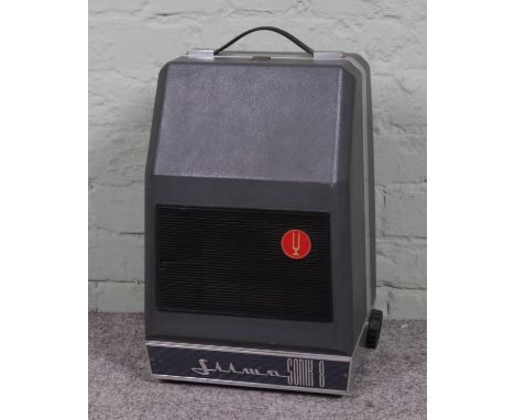 A vintage 1960s Italy Silma "Sonik 8" 8mm sound cine projector, with cable inside, untested. Length cm, height 21cm.