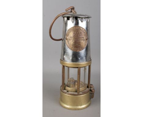 An Eccles Type GR6S miners safety lamp by the Protector Lamp and Lighting Co. Ltd. Stamped number 182 to nameplate and "Our K