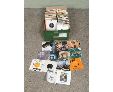 A box of assorted vinyl singles of mainly rock and pop to include Eurythmics, Duran Duran, Peter Gabriel, Phil Collins, Micha