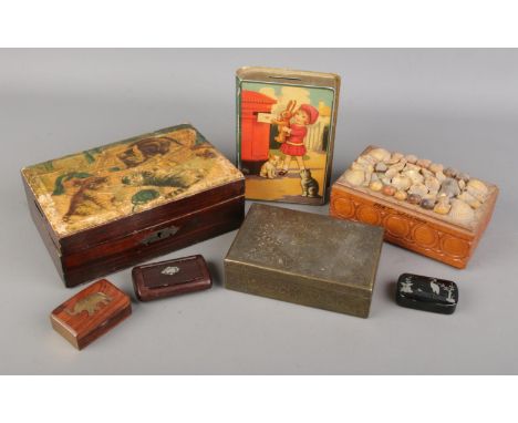 A collection of vintage and antique tins and boxes. Includes white metal inlaid snuff box, Kinco cigarette box, Chad Valley M
