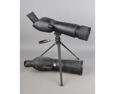 An Optus scope on tripod together with an Adventuridge scope