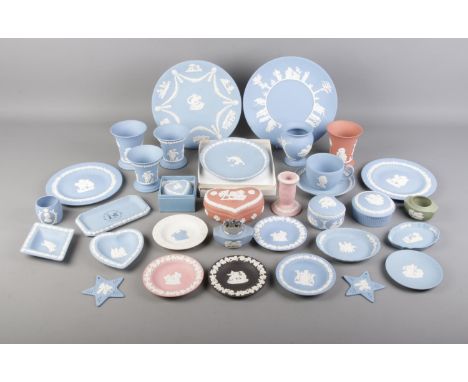 A quantity of Wedgwood Jasperware in various colours. To include teacup and saucer, plates, trinket box and boxed 50th Annive