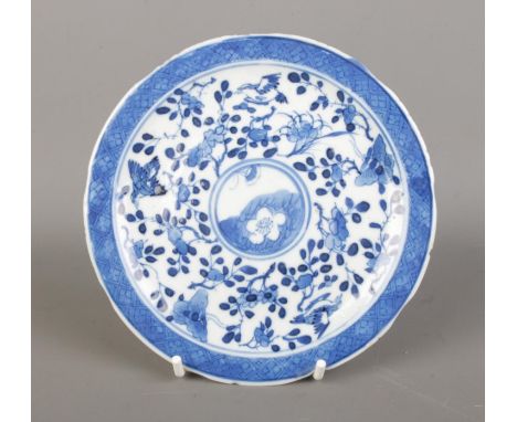 A Chinese Qing Dynasty Kangxi (1662-1722) blue &amp; white porcelain plate, feature branching blossoms and birds, with a four