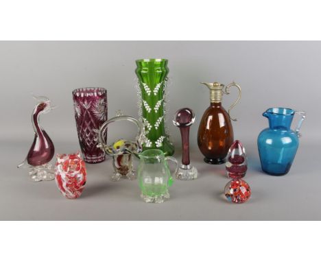A collection of decorative glassware, to include ruby flash vase, basket, Uranium jug, paperweight and small jack in the pulp