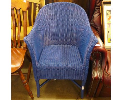 A blue painted Lloyd Loom armchair 