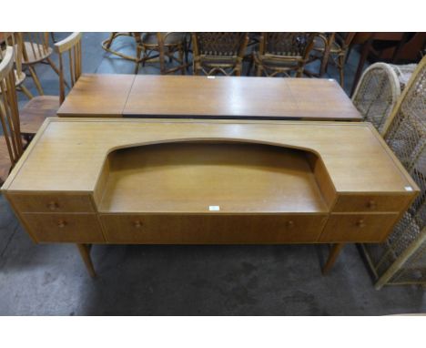 A light oak sideboard 