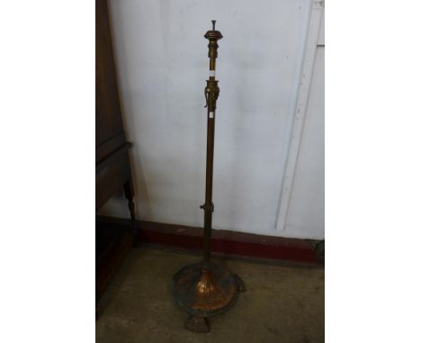An Arts and Crafts copper floor standing lamp 