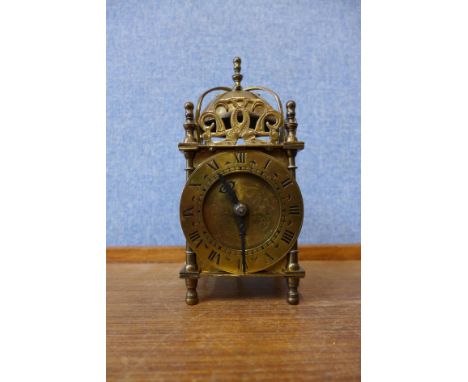 A small Smith electric brass lantern clock 