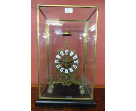 A cased brass fusee skeleton clock 