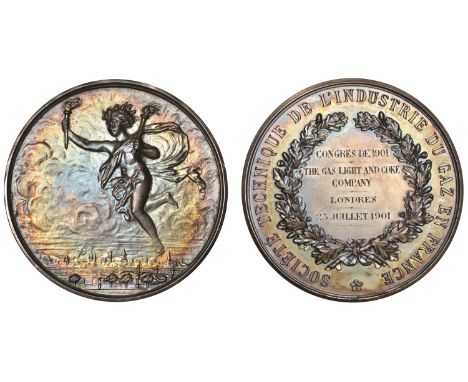 FRANCE, Société Technique de l’Industrie du Gaz en France, a silver award medal, unsigned, cherub holding two torches, rev. w