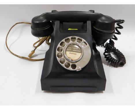 A vintage bakelite telephone GPO no.332L