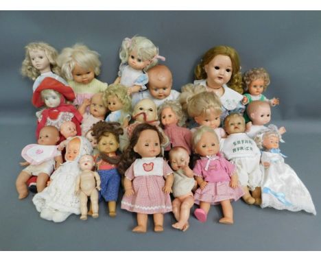 A quantity of 24 mixed dolls including Playmates &amp; Mattel