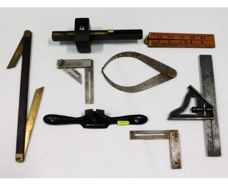 A selection of measuring tools, a rosewood mortice marking gauge &amp; a spoke shave