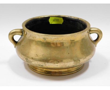 A late 18thC, early 19thC. Chinese footed bronze censer with earlier 14th/15thC. six character tribute mark to the base, 6.25