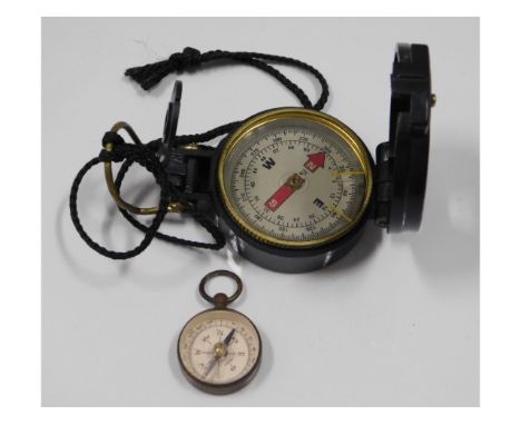 A miniature vintage brass pocket compass &amp; an Engineer Directional Compass