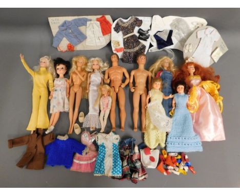 A quantity of 11 mixed dolls including Sindy, clothes, Pedigree man &amp; Mattel man