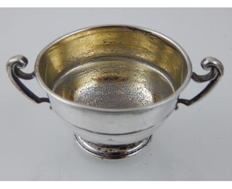 A small silver trophy cup, Birmingham 1898 - Elkington & Co., with twin handles, girdle and gilded interior, 1.2ozt.