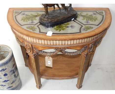 An 18th century style Italian design bowfront console table and mirror, inset polychrome painted glass panels the swagged dom
