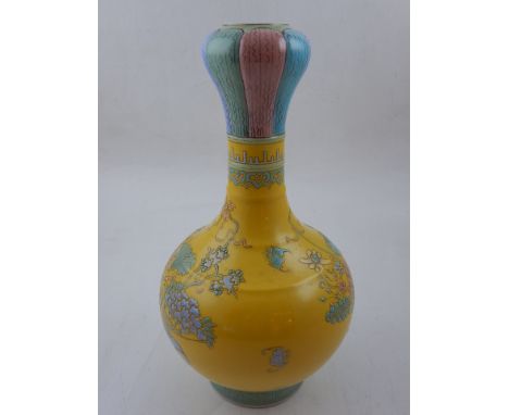 A Chinese Qing dynasty yellow ground garlic head vase, polychrome decorated with flowers and bats, having Greek key border, b