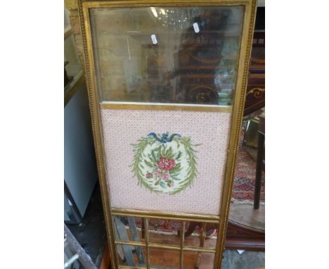 A small late Victorian gilt framed two-fold screen, inset tapestry and mirror panels. H. 114cm