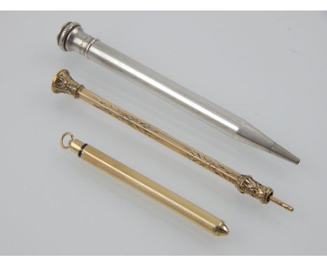 An early 20th century 9ct yellow gold propelling pencil with engine turned decoration together with an earlier engraved yello