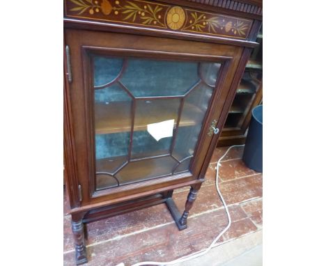 An Edwardian mahogany hanging cupboard, the moulded cornice above an inlay panel and astragal door enclosing shelves, W. 47cm