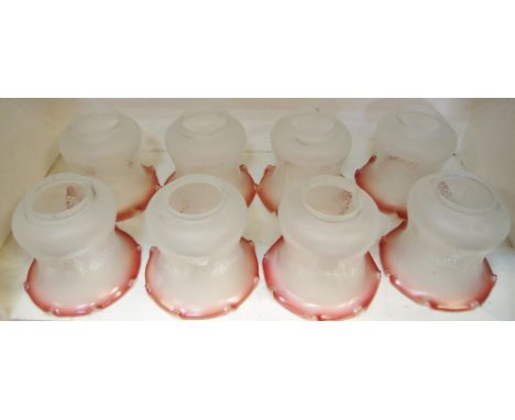 Eight cranberry and frosted light shades decorated with Neo Classical swags