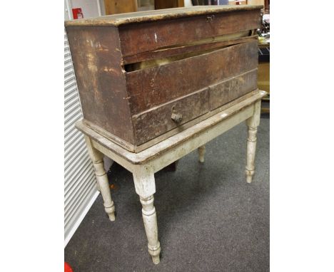 A rustic Victorian painted pine kitchen table; a Victorian stained pine mule chest; rustic potato fork; another, mincer; hors