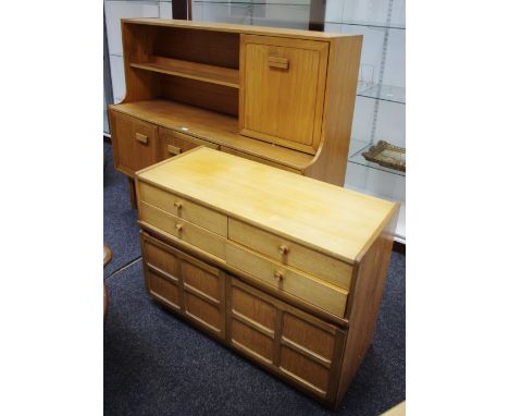 A Nathan Furniture retro teak cabinet, four short drawers over two door cupboard;  An Alfred Cox retro teak sideboard, fall f