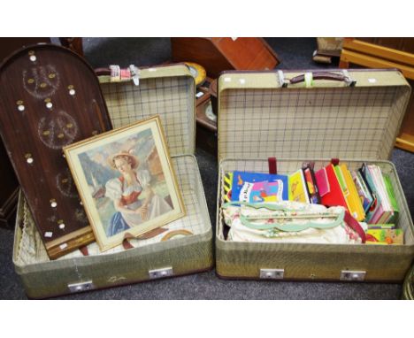 A Revelations suitcase; prints; display cabinet; knitting needles; children's' books; a bagatelle board