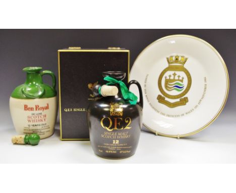 A QE2 Single Malt Scotch Whisky in presentation box; a Ben Royal Whisky; a Royal Doulton Royal Princess commemorative plate (