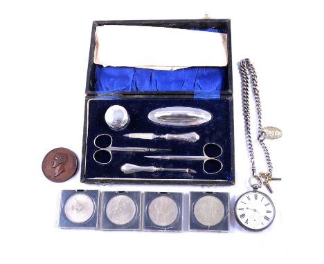 A silver dressing table nail set, G&amp; C Ltd, Birmingham 1925, cased; a silver open face pocket watch, the white enamel dia