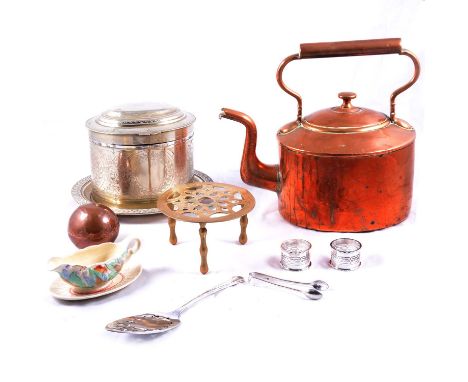 Victorian copper kettle, silver-plated biscuit box, brass trivet, plated flatware, Clarice Cliff sauce boat and stand.