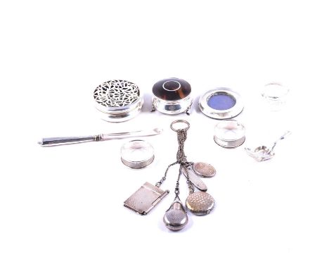 Base metal chatelaine with five attachments, silver ring boxes, caddy spoon, napkin ring, and other small objects.