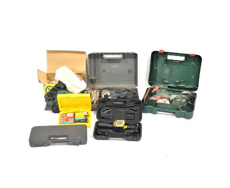 Various boxed tools including electric plane, sander and jigsaw