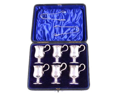 A set of six miniature silver tankards / spirit measures, Henry Wilkinson &amp; Co Ltd, London 1905, in a fitted case; and tw