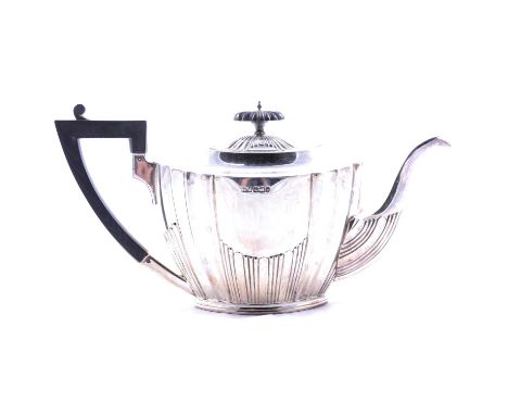 Silver teapot, Lee &amp; Wigfull, Sheffield 1899, oval with fluted decoration, ebonised handle and finial, 16cm, 18ozt gross.