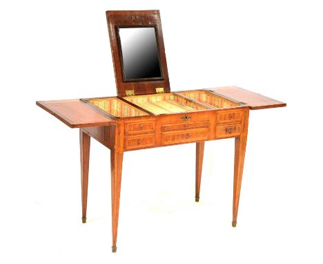 19th Century French walnut and parquetry dressing table, the top with hinged lid enclosing a mirror, slide and drawer to the 
